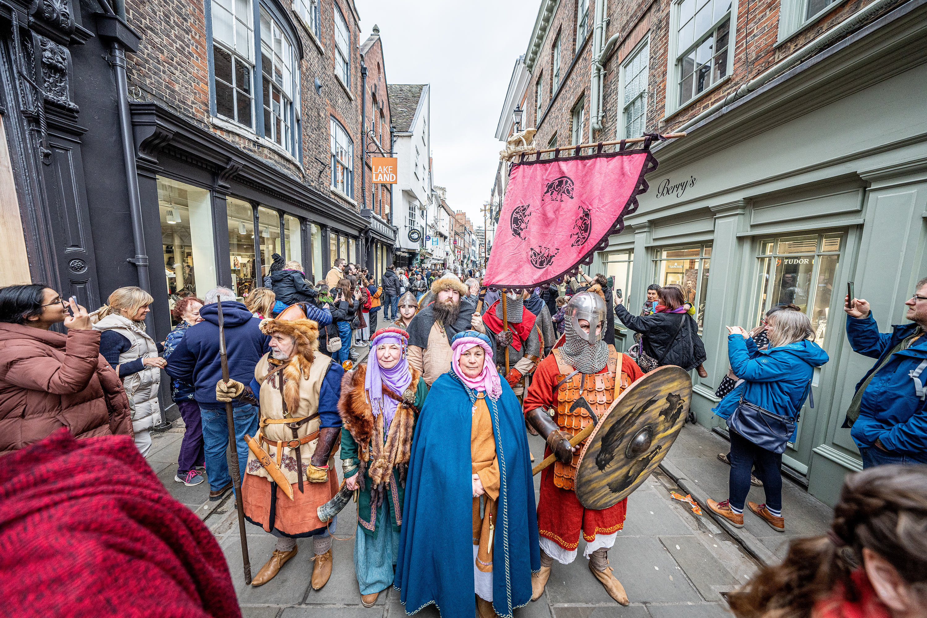 Viking march taking place on Coppergate in York